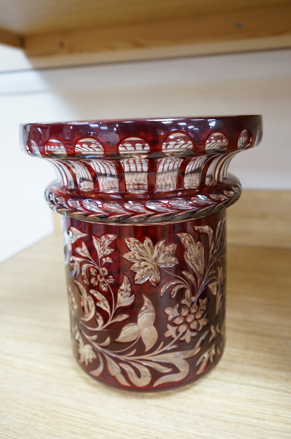 A large early 20th century Bohemian or Czechoslovakian ruby overlaid glass vase, 28cm high